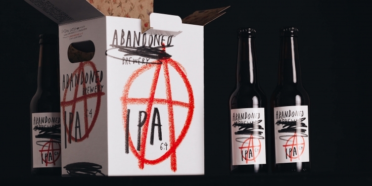 A collection of beer bottles from Abandoned Brewery with branding designed by Chrometoaster.