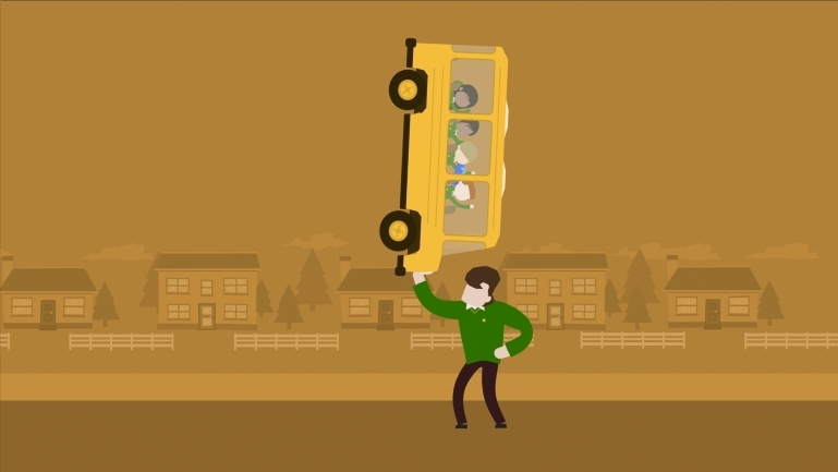 Still of a boy lifting a bus